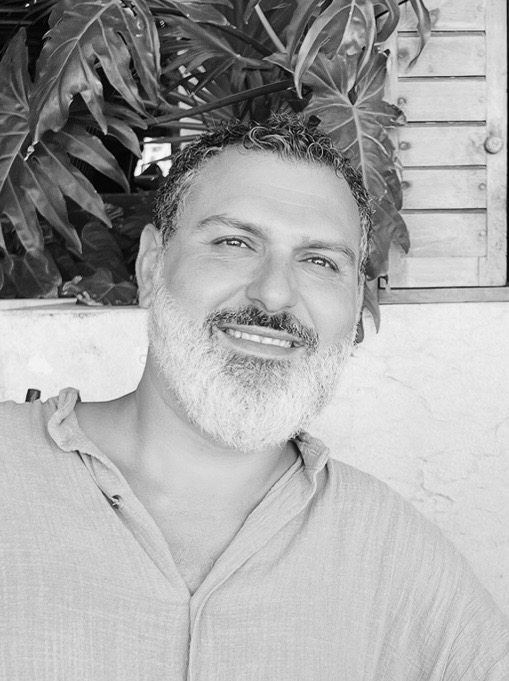 Nader Hantour smiling outdoors